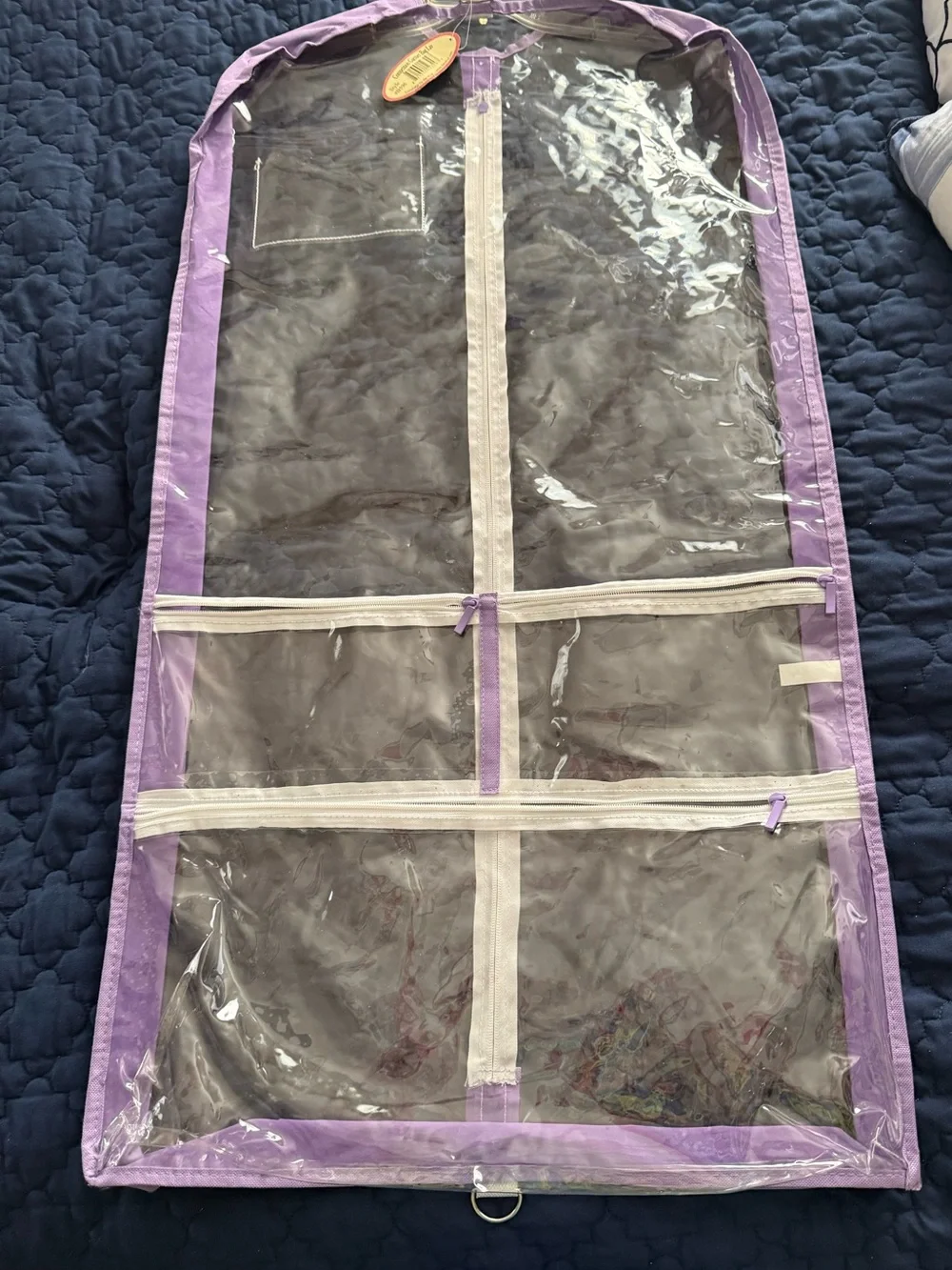 Clear Garment Bag with Purple Trim and Multiple Zippered Pockets